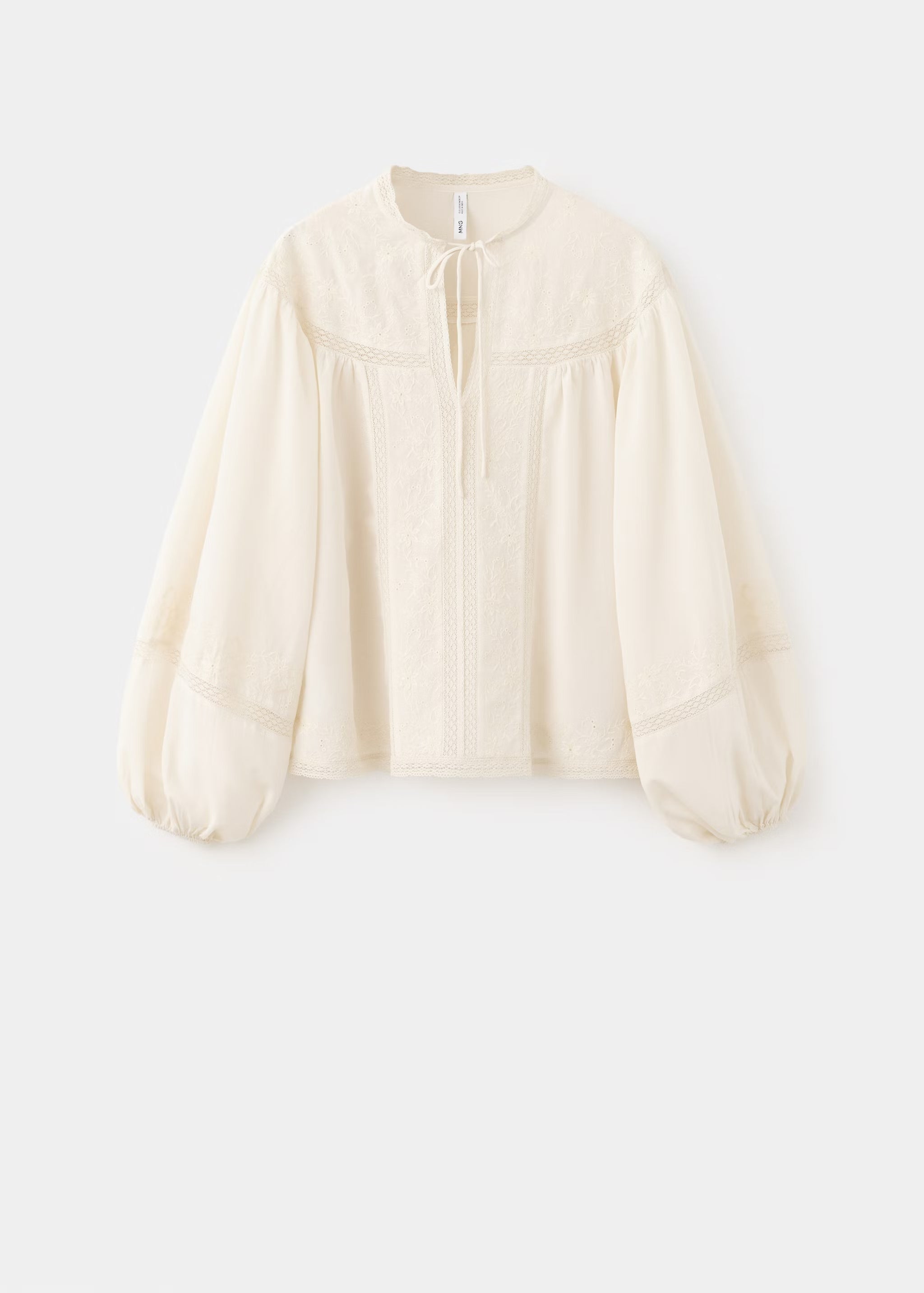 Blusa manga abullonada bordada (49,99 €) | Mango