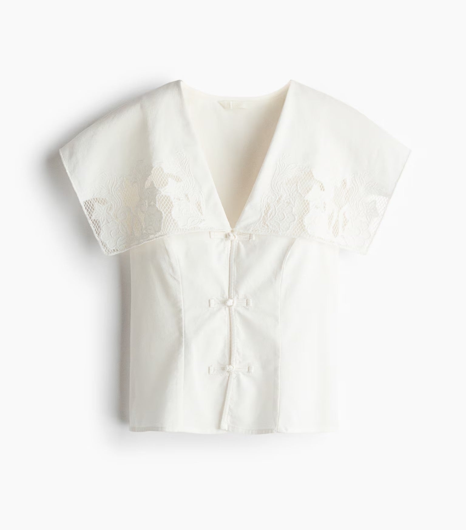 Top con cuello marinero y bordado inglés (23,99 €) | H&M