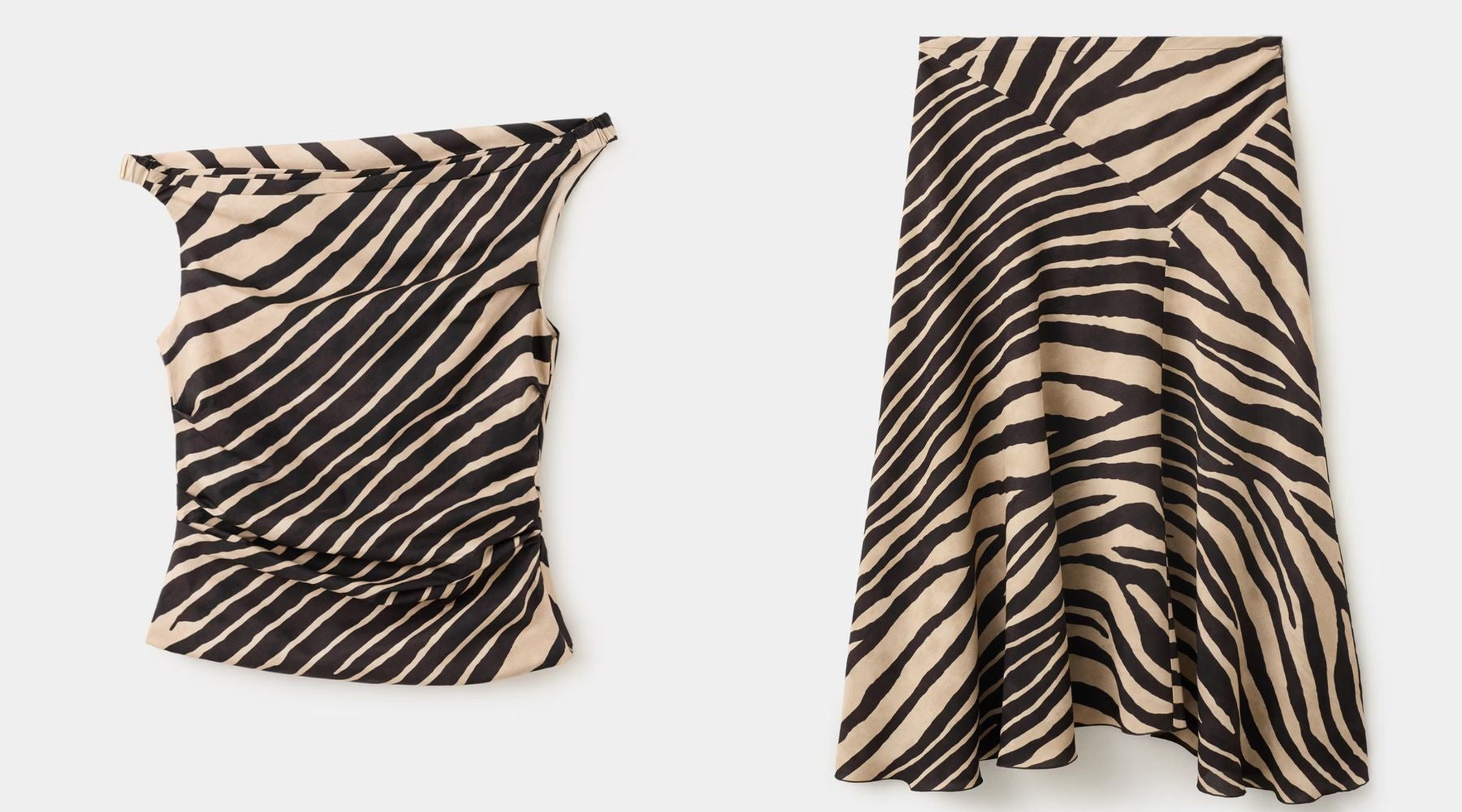 Top asimétrico drapeado (29,99 €) y falda asimétrica midi (39,99 €) | Mango