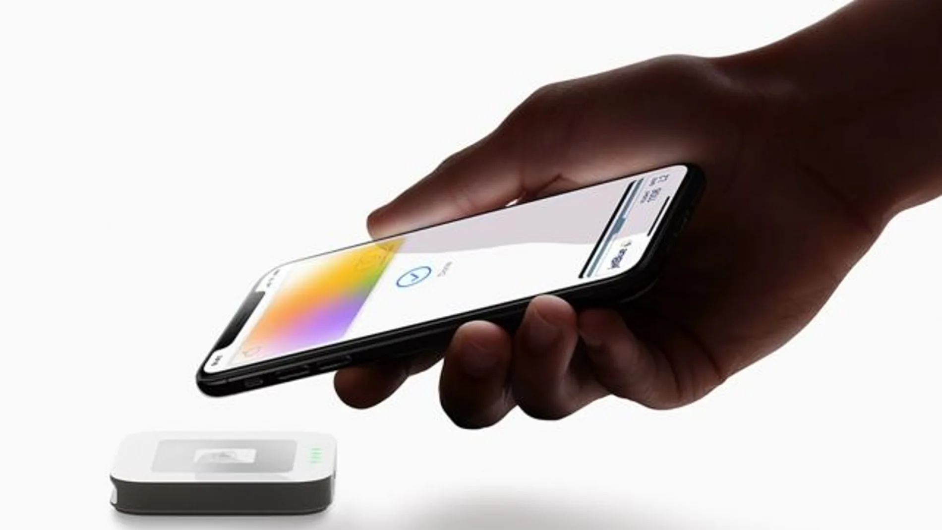 Apple Card hand iPhoneXS payment 032519_643x397