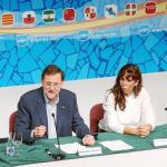 Rajoy y Sánchez-Camacho, durante el acto de ayer