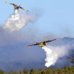 Aviones apagafuegos de media docena de países ayudan en las difíciles tareas de extinción