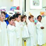 Un grupo de niños y niñas del Colegio Arenales en una representación navideña de este mes de diciembre