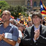 El ex presidente de la Generalitat, Carles Puigdemont junto a Pep Guardiola.