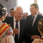 Ximo Puig y José Manuel García-Margallo, ayer en el acto celebrado en la Lonja de Valencia