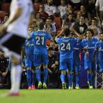 Zenit's Hulk, background third right, celebrates after scoring against Valencia during a Group H Champions League soccer match between Valencia and Zenit Saint Petersburg, at the Mestalla stadium in Valencia, Spain, Wednesday, Sept. 16, 2015. (AP Photo/Alberto Saiz)