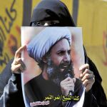Una partidaria del clérigo Nimr Baquir al Nimr se manifiesta en Saná (Yemen) contra su condena a muerte en 2014