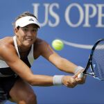 Muguruaza se despide; Halep y Azarenka cumplen y Wawrinka sufre