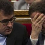 El secretario de Hacienda de la Generalitat, Lluís Salvadó, junto a Oriol Junqueras