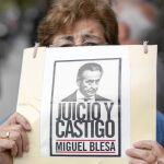 Preferentistas se manifiestan en la Audiencia Nacional el día de la declaración del ex presidente en 2014
