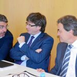 Sánchez, Puigdemont y Mas, ayer, durante el comité ejecutivo de Convergència