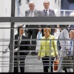 La canciller alemana, Angela Merkel, junto a Mario Draghi, director del BCE; el presidente francés, François Hollande, y Jean-Claude Juncker