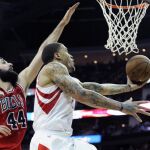Michael Beasley y Nikola Mirotic
