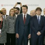 El ministro de Industria, Energía y Turismo, José Manuel Soria (c), junto al presidente catalán, Carles Puigdemont (2d); la alcaldesa de Barcelona, Alda Colau (2i); entre otros, durante la inauguración del Congreso Mundial de Móviles que se celebra desde hoy, en el recinto Gran Vía de Fira de Barcelona