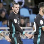 Sergio Ramos, Bale y Asensio, después de uno de los goles del Madrid ayer en Anoeta