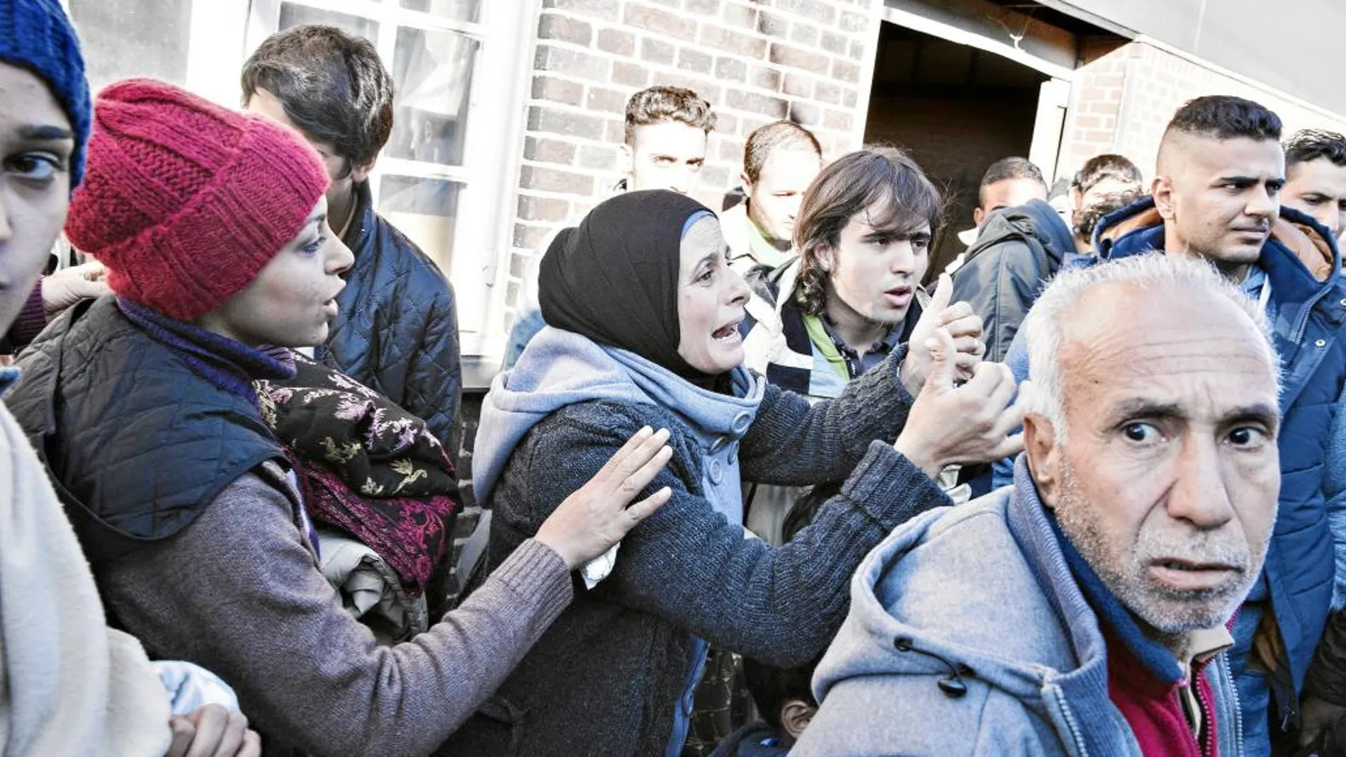Inmigrantes sirios en la estación de Padborg, Dinamarca