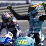 El piloto español Joan Mir (d), del equipo Leopard Racing, celebra junto a Jorge Martín (i), que terminó tercero, su victoria en la carrera de Moto3 del Gran Premio de Cataluña.