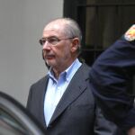 Rodrigo Rato tras el registro de su oficina