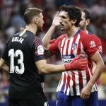 Los jugadores del Atlético de Madrid Jan Oblak y Stefan Savic.