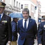 Ignacio Cosidó, Javier Peña Echeverría y Francisco Otero, en el acto en León