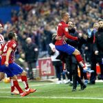 Griezmann celebra con el Cholo su gol