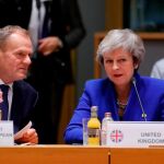 Theresa May, junto a Donald Tusk