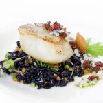 Vieira a la plancha sobre arroz