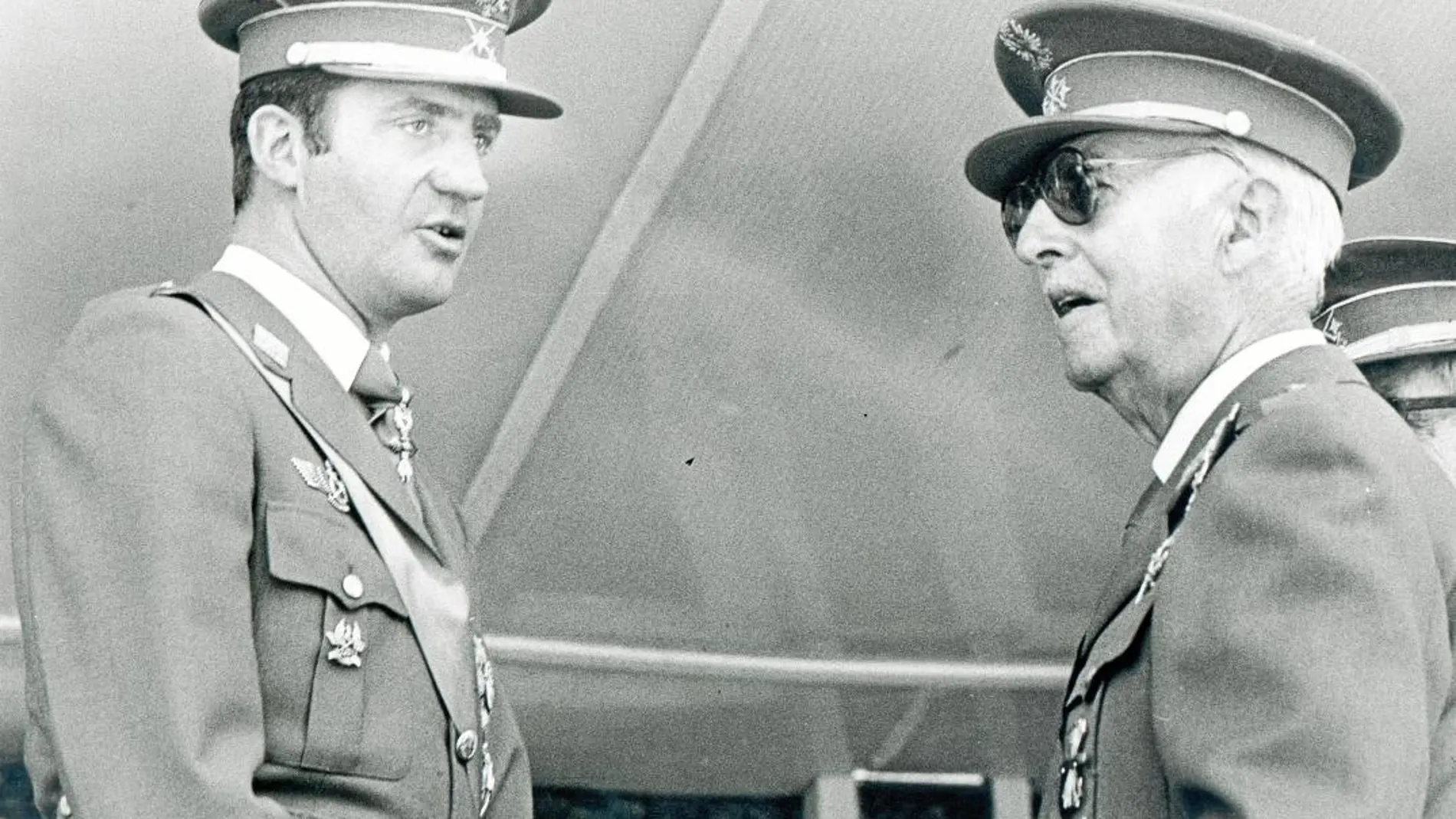 Don Juan Carlos junto a Franco