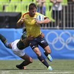 Cesar Sempere con Justin Geduld durante el partido