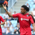 El delantero francés del Getafe Loic Remy celebra tras marcar ante el Málag / Foto: Efe