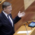 El presidente Puig recibió las criticas del grupo Podemos por el aumento de los desahucios