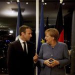 El presidente francés y la canciller alemana, ayer, durante la cumbre informal de la UE en Tallin
