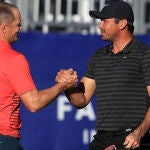 Alex Noren y Jason Day