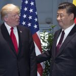 El presidente estadounidense, Donald Trump, l y su homólogo chino, Xi Jinping, el pasado mes de julio en la cumbre del G-20 en Hamburgo