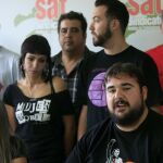Óscar Reina, portavoz del Sindicato Andaluz de Trabajadores (SAT), abajo a la derecha, en un acto de la organización