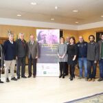 El presidente de la Diputación de Sevilla, Fernando Rodríguez Villalobos, junto a otros participantes en el congreso que posan ante el cartel anunciador