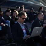 Uno de los asistentes al Web Summit, con su portátil