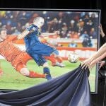 Iniesta recibe un cuadro regalo de la Federación