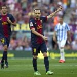 El centrocampista del Fútbol Club Barcelona Andrés Iniesta celebra el gol que ha marcado al Málaga, durante el partido de la última jornada de Liga de Primera División disputado esta tarde en el Camp Nou.