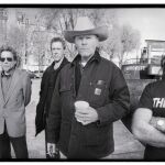 Michael Gira, el segundo por la derecha, junto a su banda