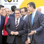 Mas, ayer, junto al Príncipe de Asturias y el ministro Soria en el Congreso de Móviles