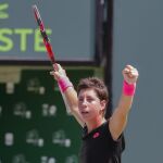 La española Carla Suárez celebra su victoria ante la alemana Andrea Petkovic.