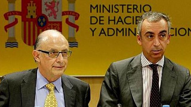 Cristóbal Montoro, ministro de Hacienda, y Miguel Ferre, secretario de Estado de Hacienda.