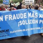 Afectados de Forum y Afinsa se manifiestan en 2011 por las calles de Madrid.