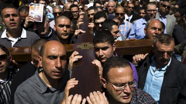 Un momento de la procesión en la Vía Dolorosa de Jerusalén.