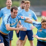 Simeone ya mira al Barcelona y planea poner a Torres en punta