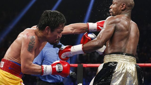 Manny Pacquiao (izd) estará de baja entre 9 y 12 meses