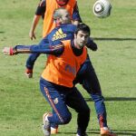 Iniesta pelea con Albiol durante el entrenamiento de ayer