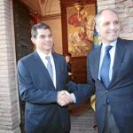 Los presidentes del PPCV, Francisco Camps, y de Unió Valenciana, José Manuel Miralles
