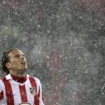 Forlán se lamenta en un momento del partido